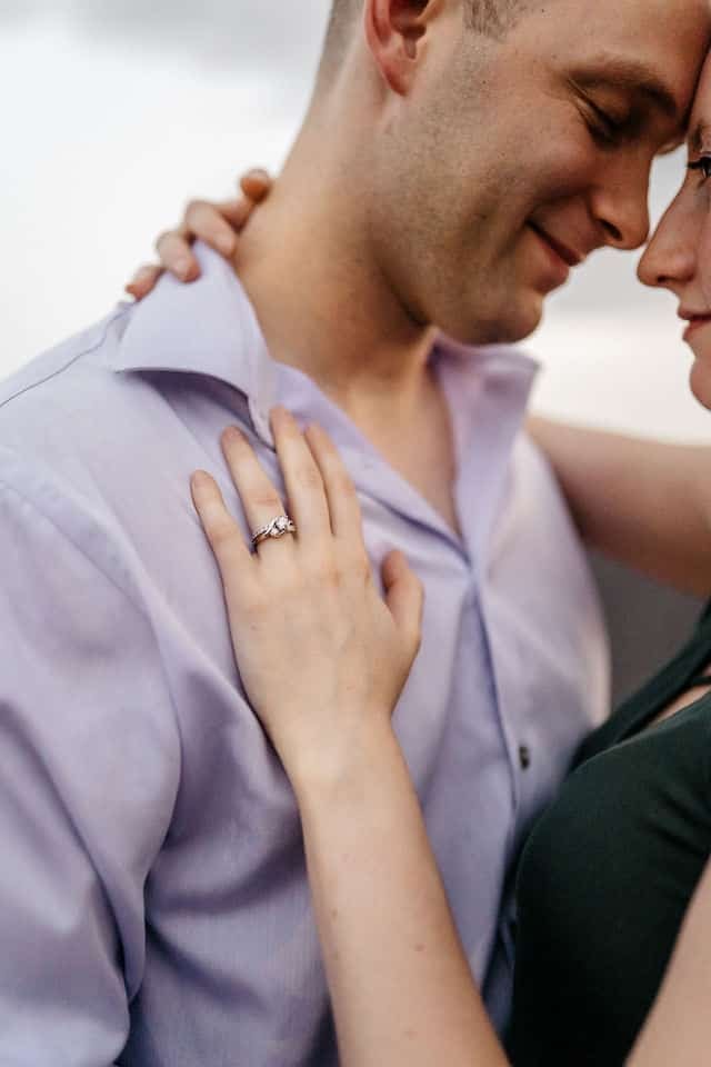 Engaged couple enjoying a relaxed outdoor date near an airport captured during a Georgia wedding videography session.